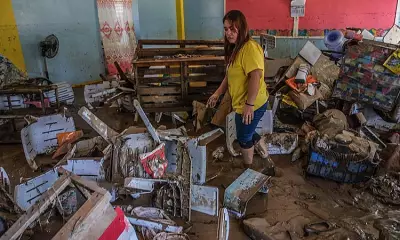Owak Teachers Salvage Records After Typhoon Tino Floods School