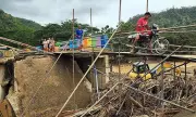 Cebu's Lusaran Isolated After Typhoon Tino Destroys Bridge