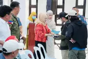 54 MILF, MNLF Members in Basilan Get Safe Conduct Passes for Amnesty