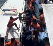 PCG Rescues 253 from Distressed Vessel off Basilan Amid Tropical Storm