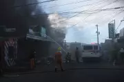 Midday Fire Destroys Naval Mall and Grocery Complex, No Casualties Reported