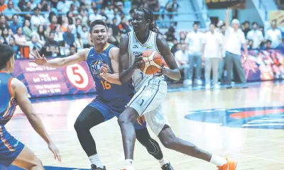 Bol Bol Powers TNT Past NLEX in PBA Quarterfinal Upset