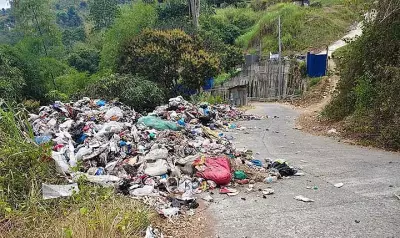 Illegal Dumping Near Cliff Alarms Cebu Residents Over River Contamination