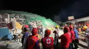 DOLE Sec. Tolentino Inspects Building Collapse Site in Angeles