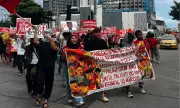 Labor Day Rally in Davao City Demands Higher Wages Despite Heavy Rain