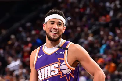 Phoenix Suns' Devin Booker switches jersey to No. 15 honoring father Melvin