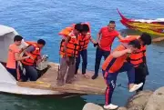 PCG Rescues 3 Fishermen from Burning Boat Off Sulu