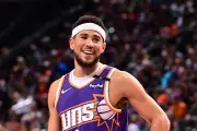 Phoenix Suns' Devin Booker switches jersey to No. 15 honoring father Melvin